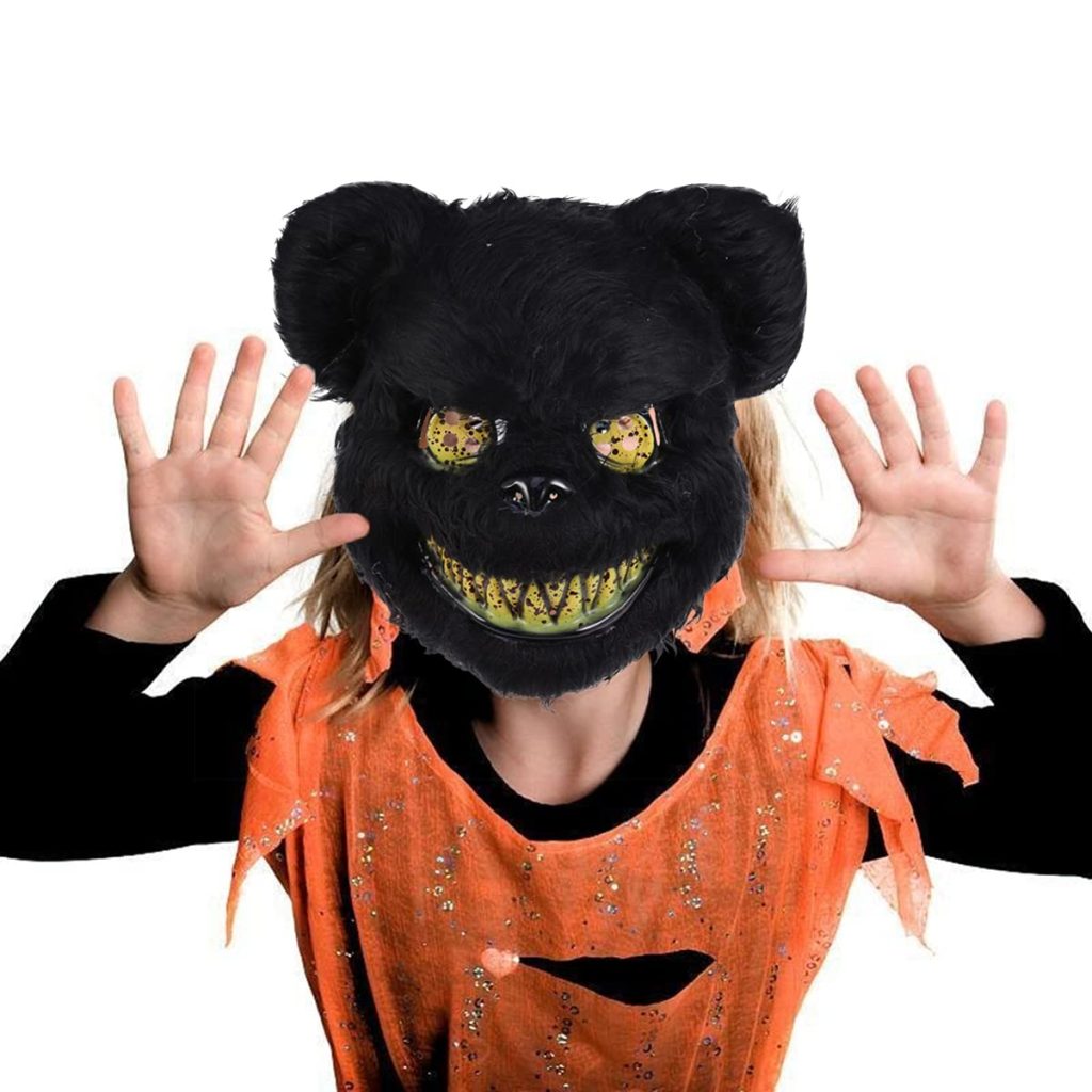 Child wearing a scary teddy bear costume, looking ready for Halloween trick-or-treating